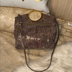 Elegant Brown Patten Leather Handbag with Gold Handle Accents